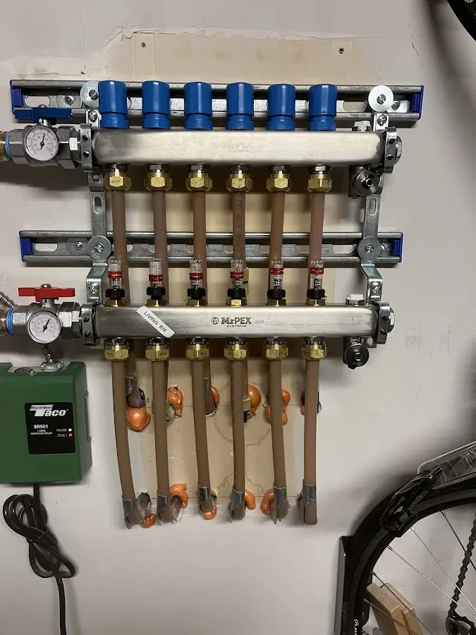 Plumber performing Leak Detection at a residential property in Bellevue